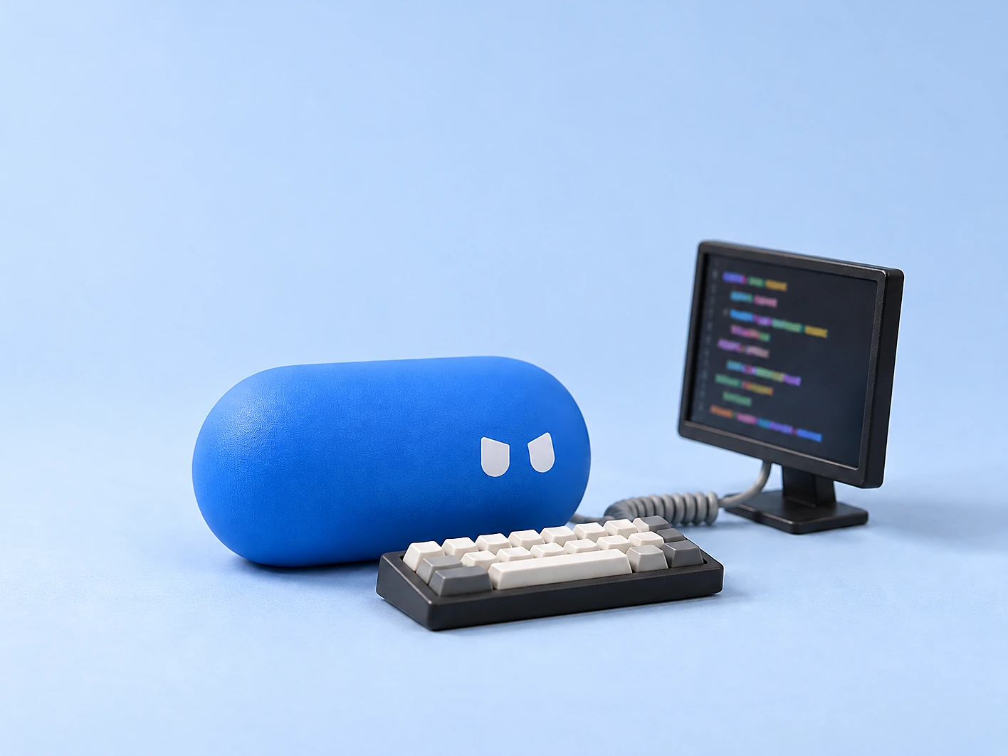 A focused blue pill lying behind a small keyboard, in front of a monitor full of code.